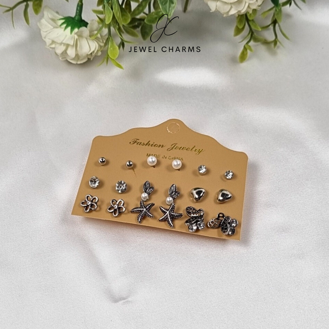 9 pairs antique silver studs pack