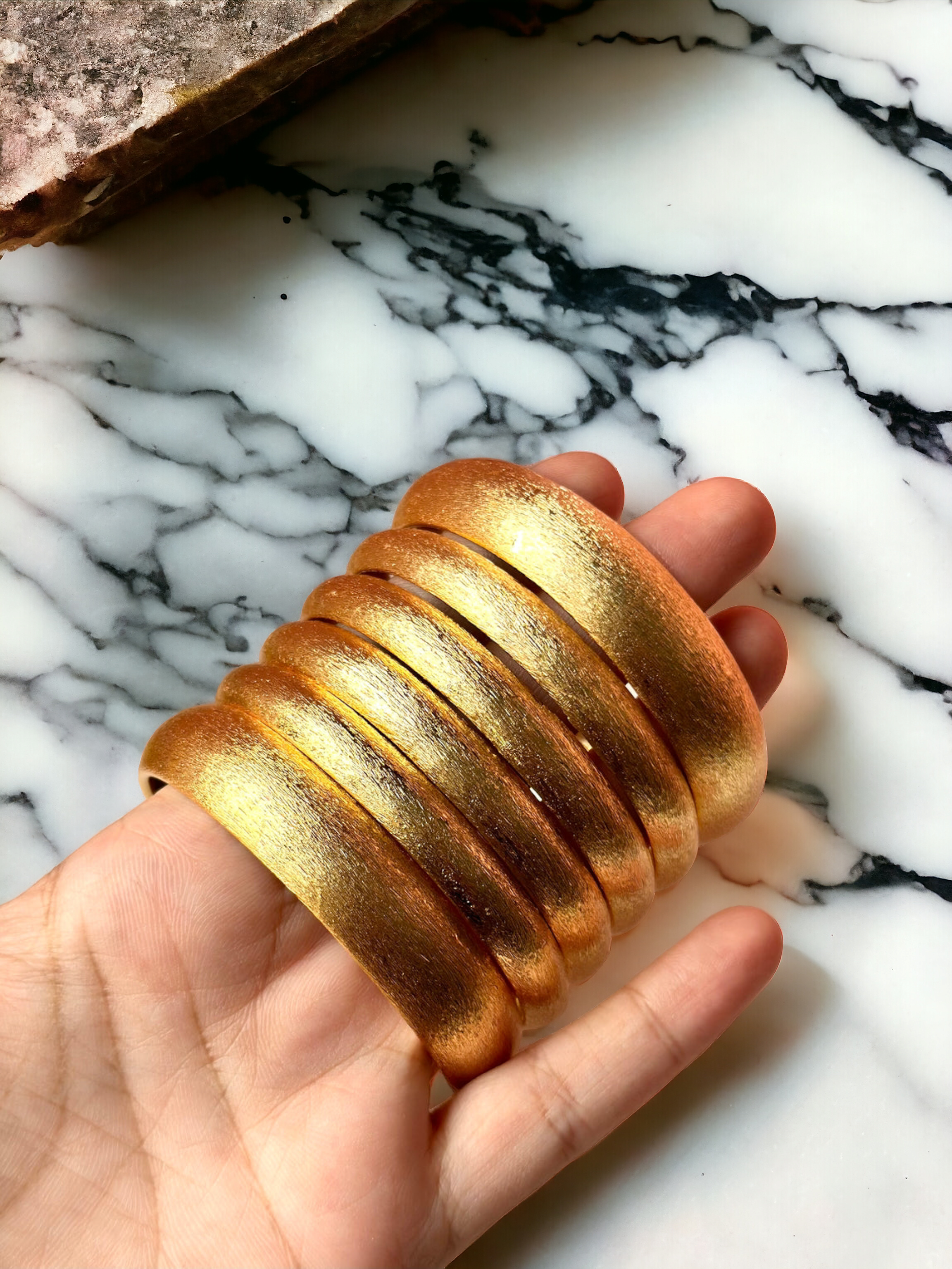 6 piece set of trending golden bangles. Water resistant
