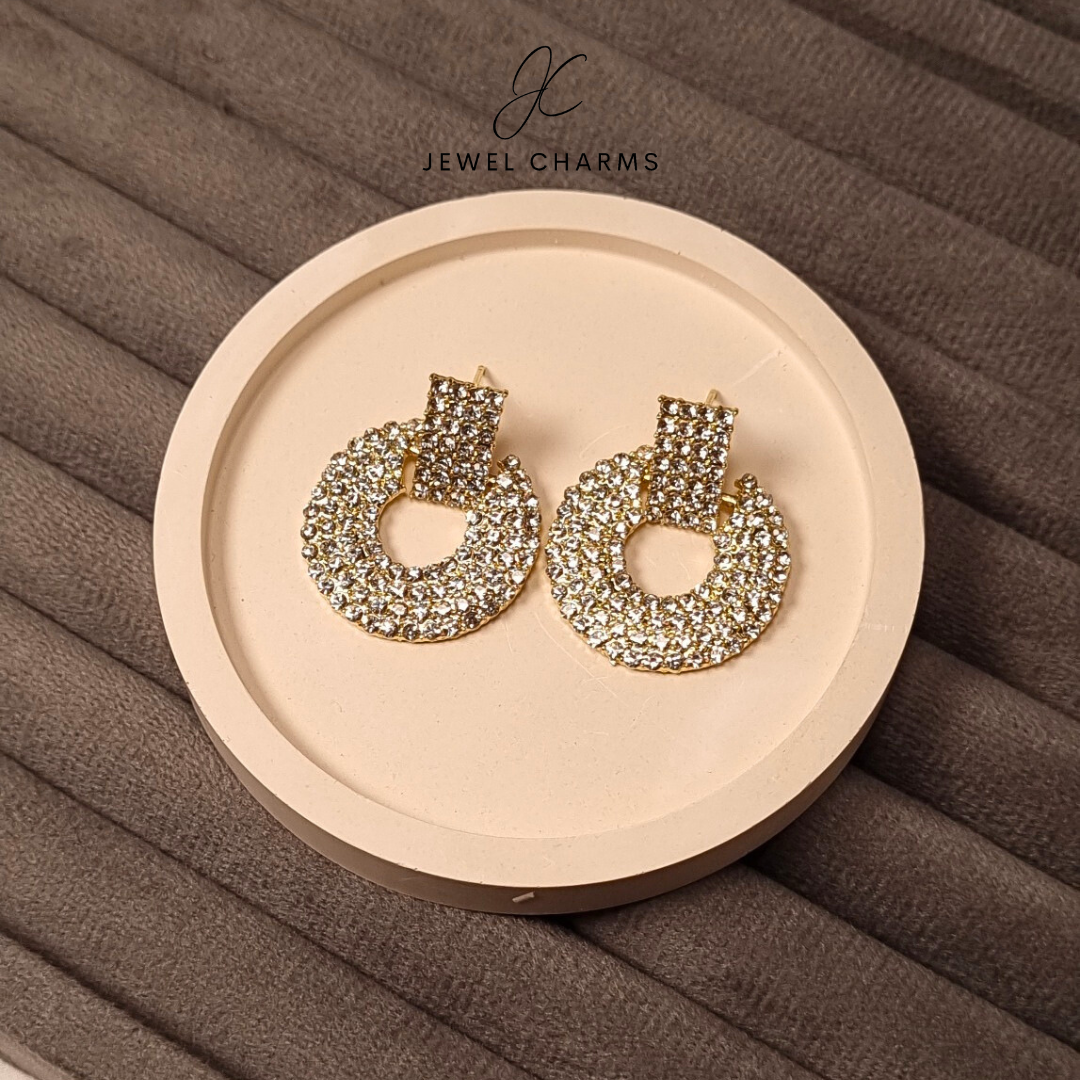 Crystal studded earrings with golden base