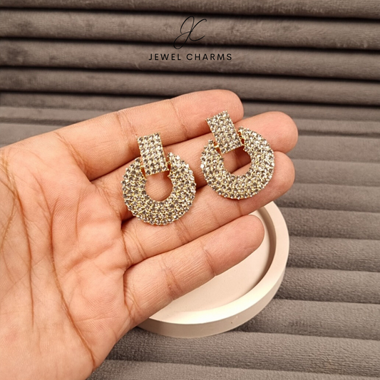 Crystal studded earrings with golden base